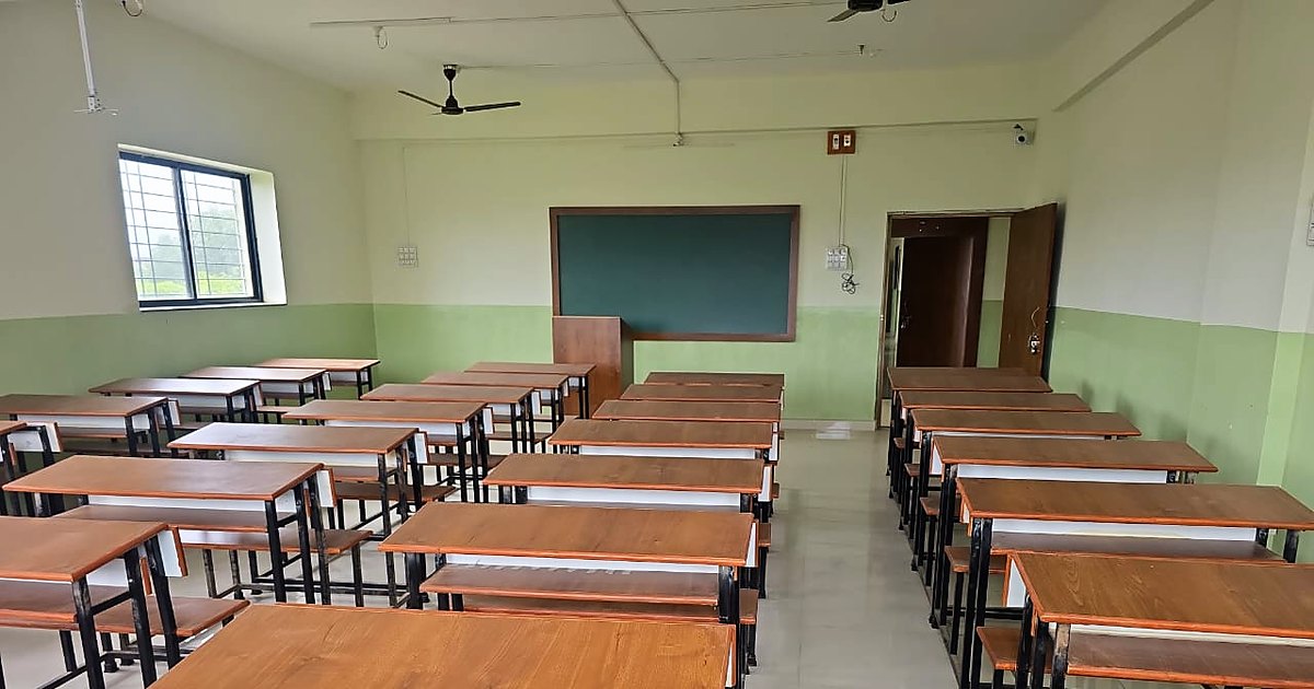 Spacious classroom with writing board at KNPIEMS