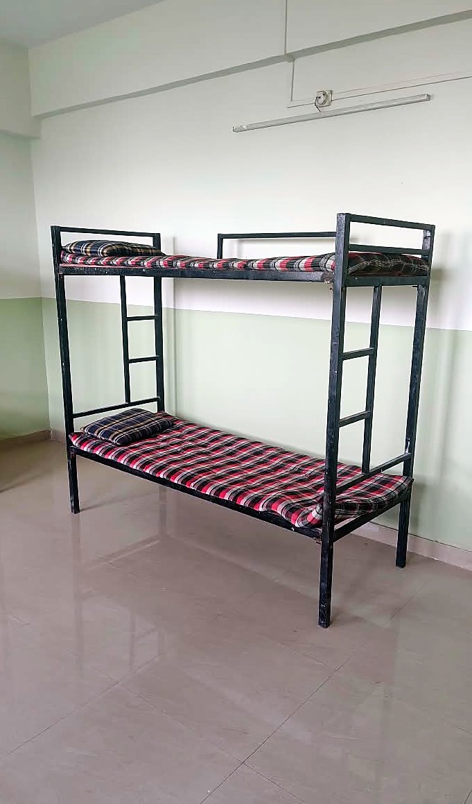 Furnished hostel room with bunk bed at KNPIEMS