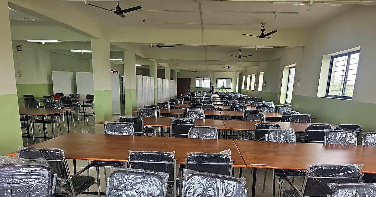 Reading room with study tables at KNPIEMS library