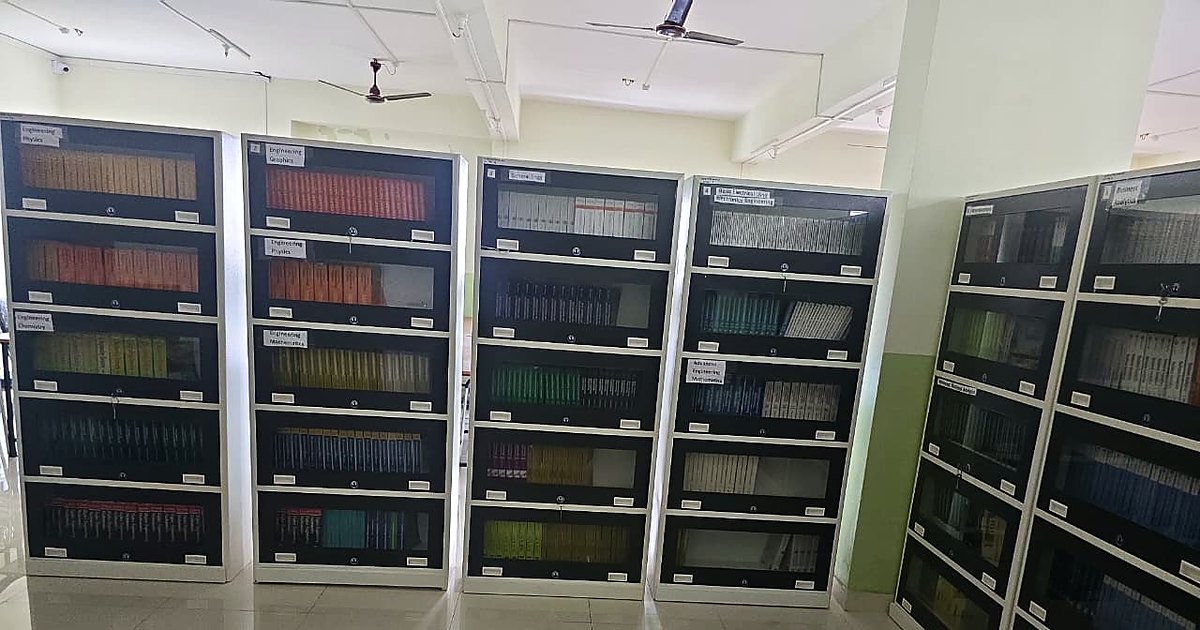 Library book stacks at KNPIEMS Chakan